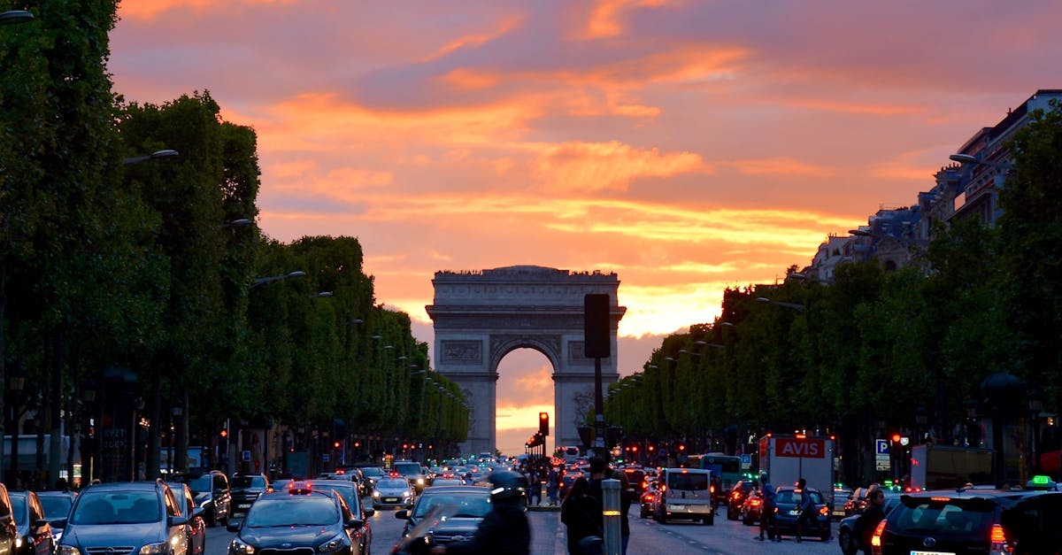 Crowded Street With Cars Along Arc De Triomphe